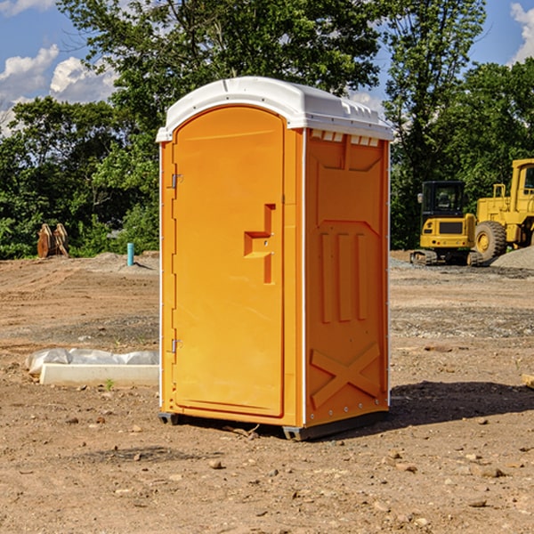 how often are the portable restrooms cleaned and serviced during a rental period in South Dennis